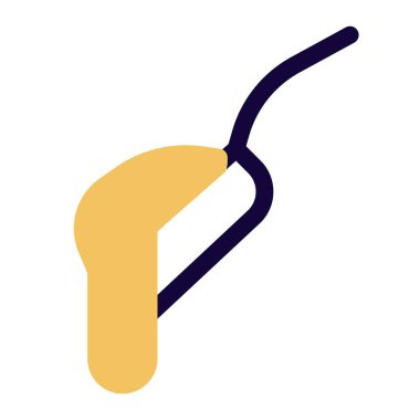 Fresh cooked caramel dripping from spoon