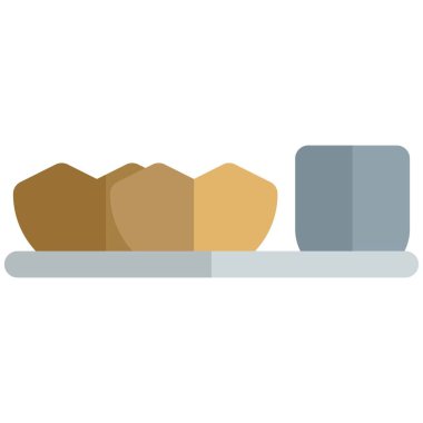 Panipuri served with spicy water.