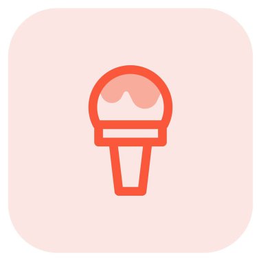 Waffle cone decorated with chocolate sauce.