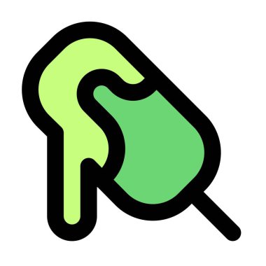 Melting cocoa ice bar on a stick.