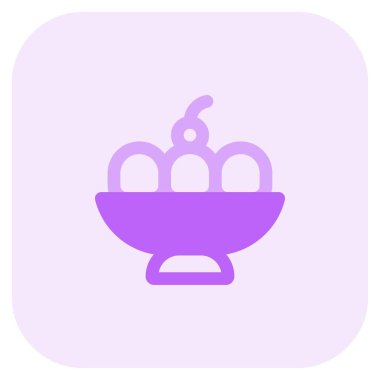 Mixed ice cream scoops served in bowl.