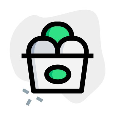 Mixed flavored ice cream scoops in cup.