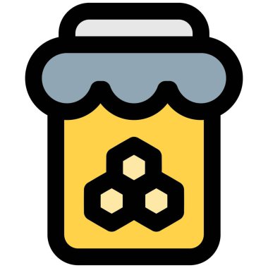 Glass jar full of sweet honey.