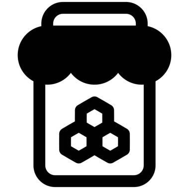 Glass jar full of sweet honey.