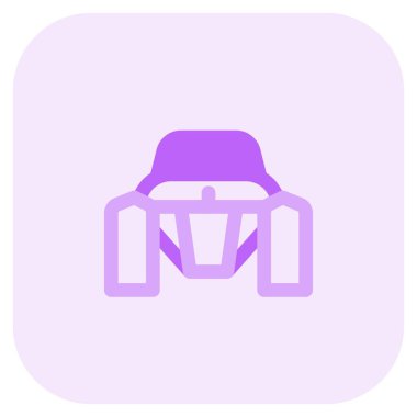 Büyük tekerlekleri olan motorlu bir araç..