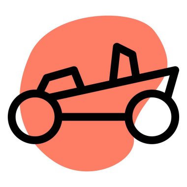 Büyük lastikleri olan dört tekerlekli plaj.