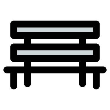 Dinlenmek için kullanılan uzun sıralı bank.