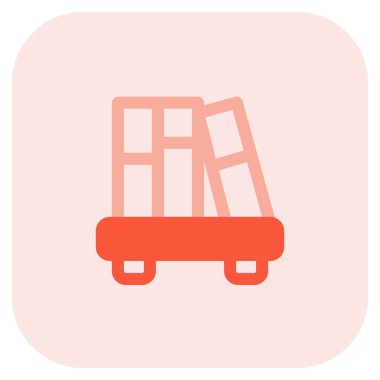 Kitapları düzenlemek için tahta bir raf kullan.