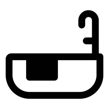 Uzun musluğu olan modern bir küvet..