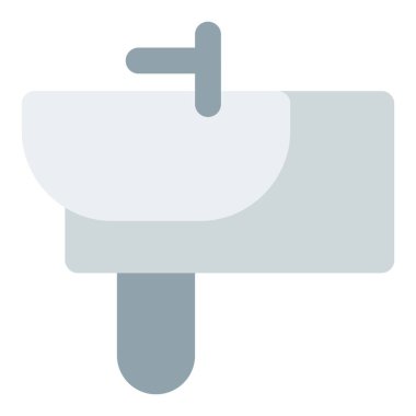 Duvarın altında şişe kapağı olan bir leğen.