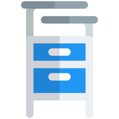 Birkaç çekmecesi olan metal dolap ya da dolap.