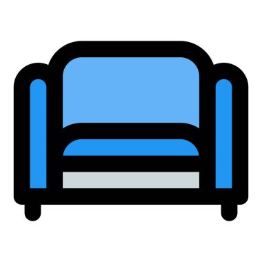 Yastıklı kanepe dinlenmek için kullanılıyor.