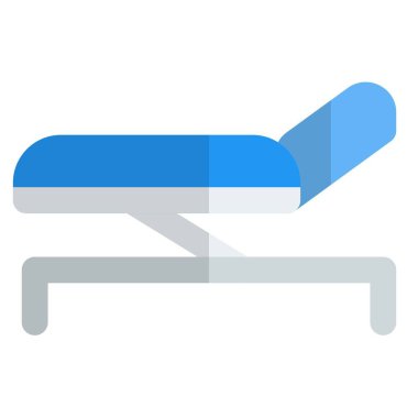 Muayene sırasında hasta desteği olarak kullanılan katlanabilir kanepe.