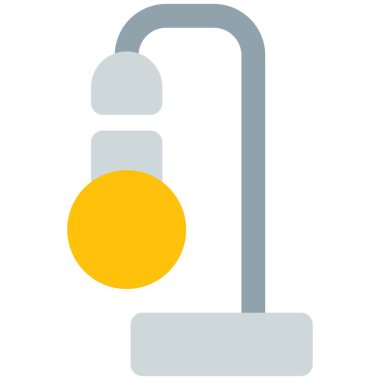 Uzun ayaklı dekoratif lamba.