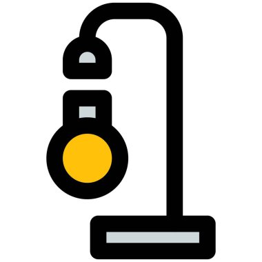 Uzun ayaklı dekoratif lamba.