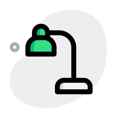 Taşınabilir lamba masaya yerleştirildi.