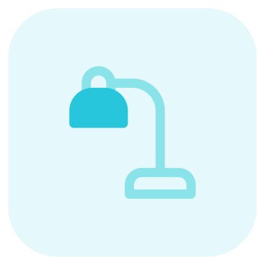 Taşınabilir lamba masaya yerleştirildi.