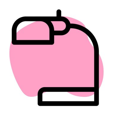 Masa başı standı olan küçük bir lamba..