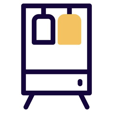 Asılı elbiseli ahşap gardırop.