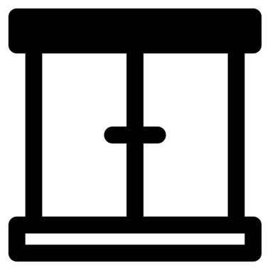 Duvara monte edilmiş bir cam pencere.