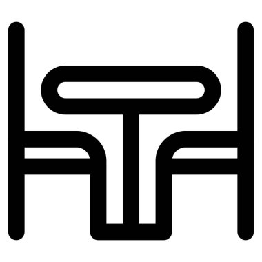 Yemek için sandalyeli uzun bir merkez masa..