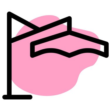 Şemsiye bir kürsüde asılı duruyor..