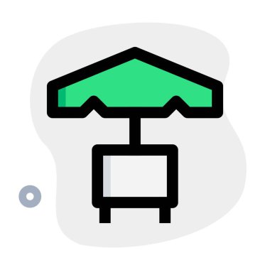 Şemsiyeli açık masa.