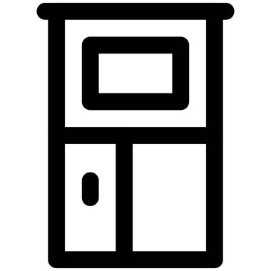 Dekor olarak tutulan uzun tahta dolap.