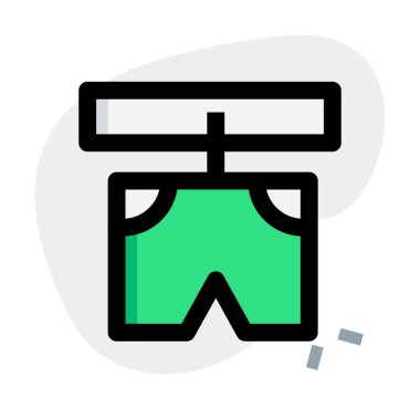 Boxer şortla duvar tutucuyu asmak.