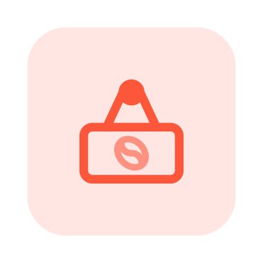 Kahve dükkanının yerini gösteren tabela asılı.