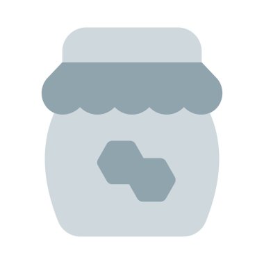 Mühürlü kavanozda taze çiğ bal depolanmış..