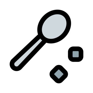 Kahveye küp şeklinde şeker ekleniyor.