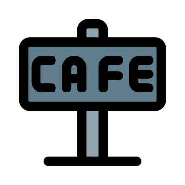 Afiş standı olan bir kafe reklamı.