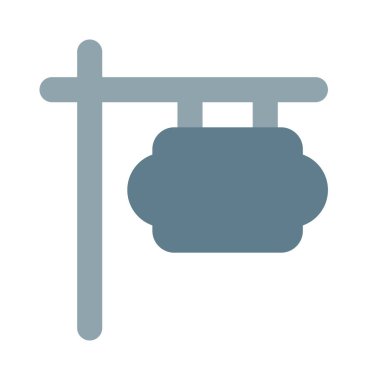 Dışarıda asılı panoda bilgi gösteriliyor.