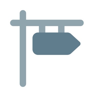 Yol işareti yön oku ile asılıyor.