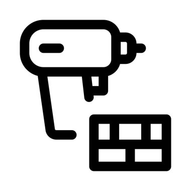 İnşaat sırasında bir duvarı delmek.