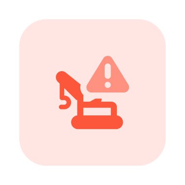 Uyarı işareti olan bir inşaat aracı..