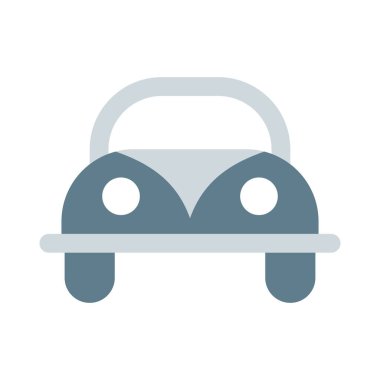 Büyük tekerlekleri olan eski moda bir araba..