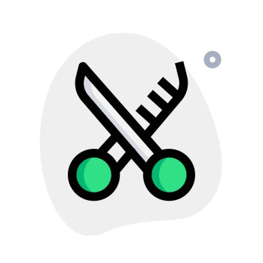 Makas. Makyaj sanatçısı saç kesimi için kullanılır.