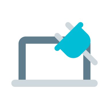 Şarj kablosuyla dizüstü bilgisayar çalıştırılıyor.