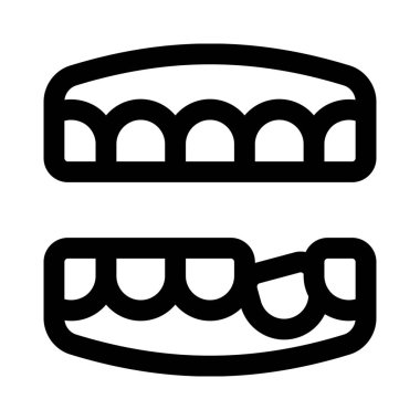 Diş telleriyle dişlerin hizalanmasını düzeltiyorum.