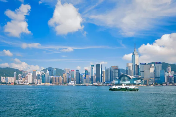 Stock image Hong Kong, China - May 1, 2018: Hong Kong skyline cityscape downtown skyscrapers over Victoria Harbour on sunset. Hong Kong, China