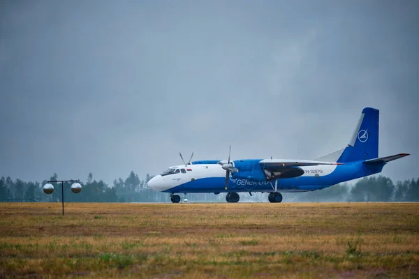 Stock image MINSK, BELARUS - JUNE 15, 2018: Genex cargo flight Antonov An-26B plane preparing to take-off on runway in National Airport Minsk