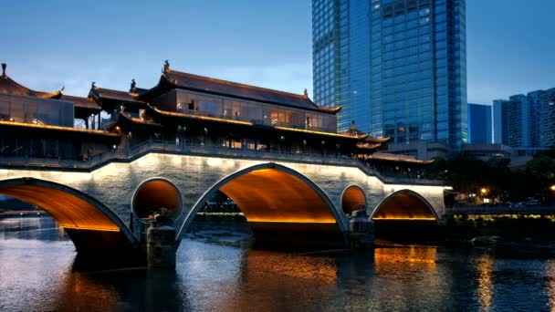 中国に照らされたジン川を渡るアンシャン橋 — ストック動画
