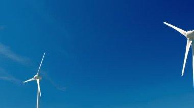 Yeşil yenilenebilir alternatif enerji kavramı - rüzgar jeneratörü gökyüzünde elektrik üreten türbinler. Yatay kamera tavası