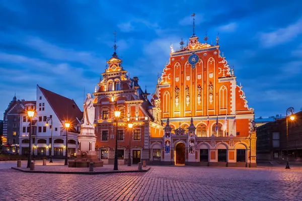 Riga Town Hall Square House Blackheads Roland Statue Illuminated Evening Royalty Free Stock Images