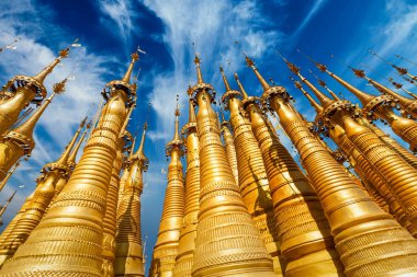 Golden stupas in Shwe Indein Pagoda, Inle lake, Myanmar clipart