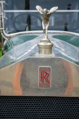 Lisbon, Portugal - October 15, 2023: The Spirit of Ecstasy Sculpture bonnet mascot on Rolls-Royce Twenty vintage classic retro car vehicle clipart