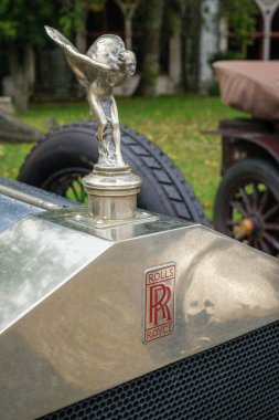 Lisbon, Portugal - October 15, 2023: The Spirit of Ecstasy Sculpture bonnet mascot on Rolls-Royce Twenty vintage classic retro car vehicle clipart