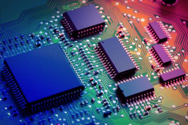 Electronic circuit board close up. clipart